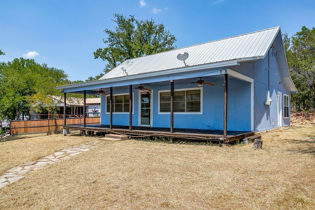 1048 Kennon Point Palo Pinto, TX 76484 - Photo 2 of 16 a view of house with outdoor space and porch