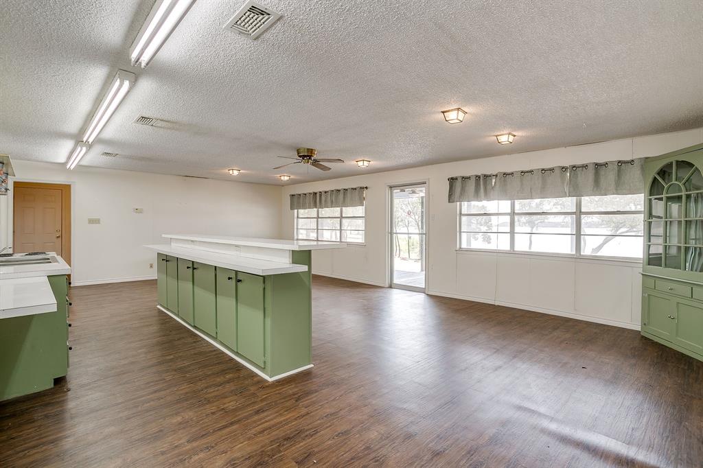 1048 Kennon Point Palo Pinto, TX 76484 - Photo 3 of 16 a living room with furniture and a wooden floor