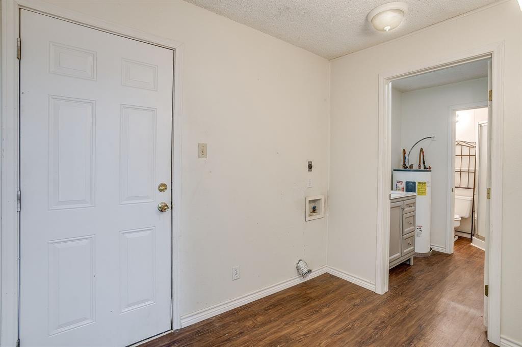 1048 Kennon Point Palo Pinto, TX 76484 - Photo 5 of 16 an empty room with wooden floor and closet