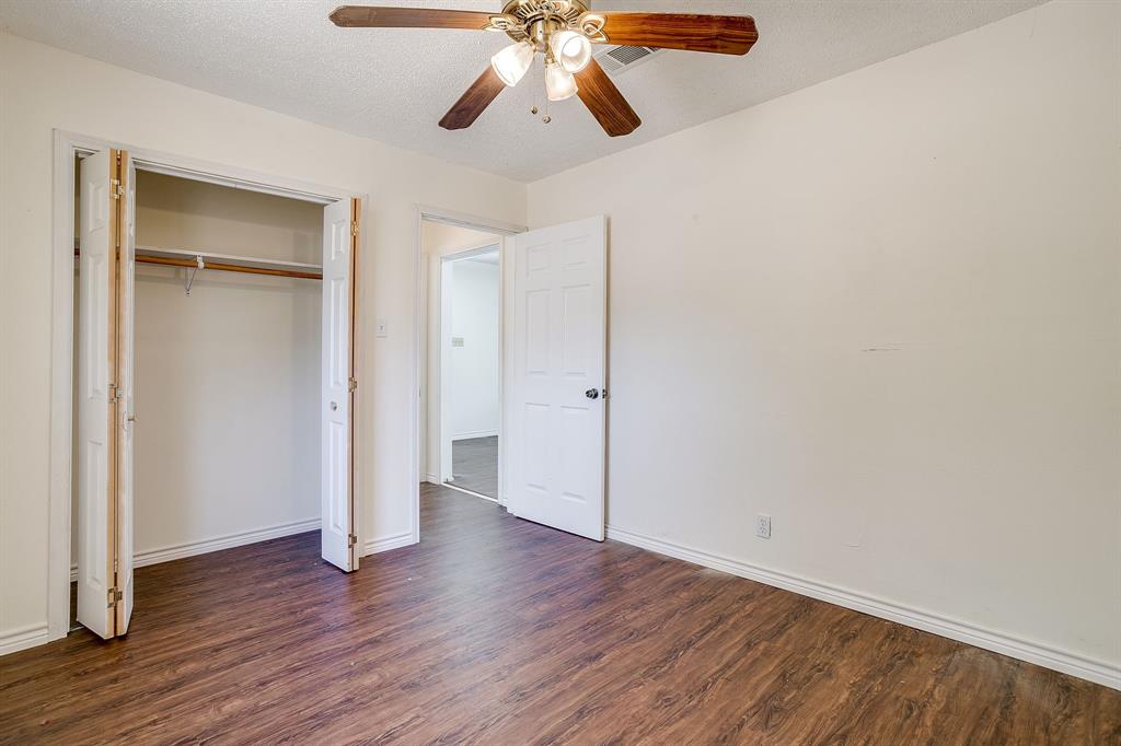 1048 Kennon Point Palo Pinto, TX 76484 - Photo 8 of 16 a view of an empty room and wooden floor