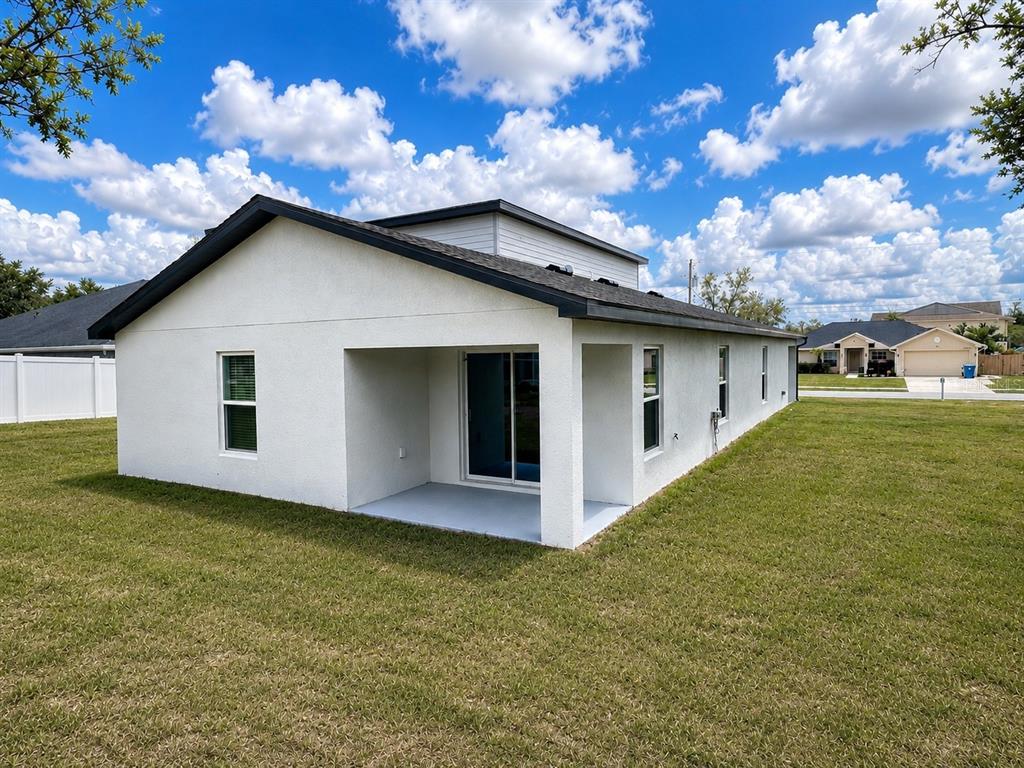 10405 Timbercrest Road Spring Hill, FL 34608 - Photo 11 of 14 a view of a backyard of the house