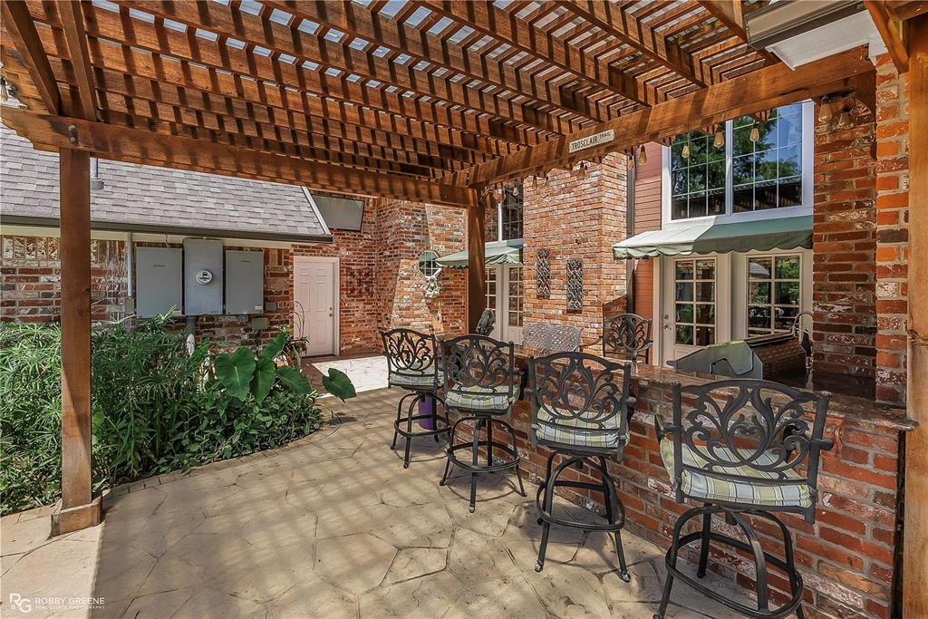 1171 Wemple Road Bossier City, LA 71111 - Photo 20 of 31 View of patio / terrace featuring a pergola