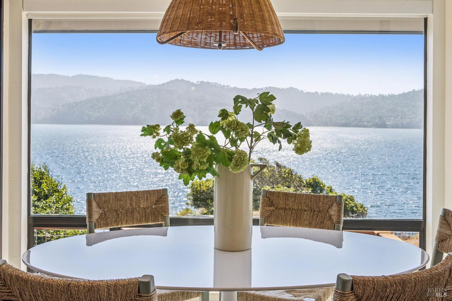 17523 Highway 1 Marshall, CA 94940 - Photo 16 of 72 a vase of flowers sitting on a table