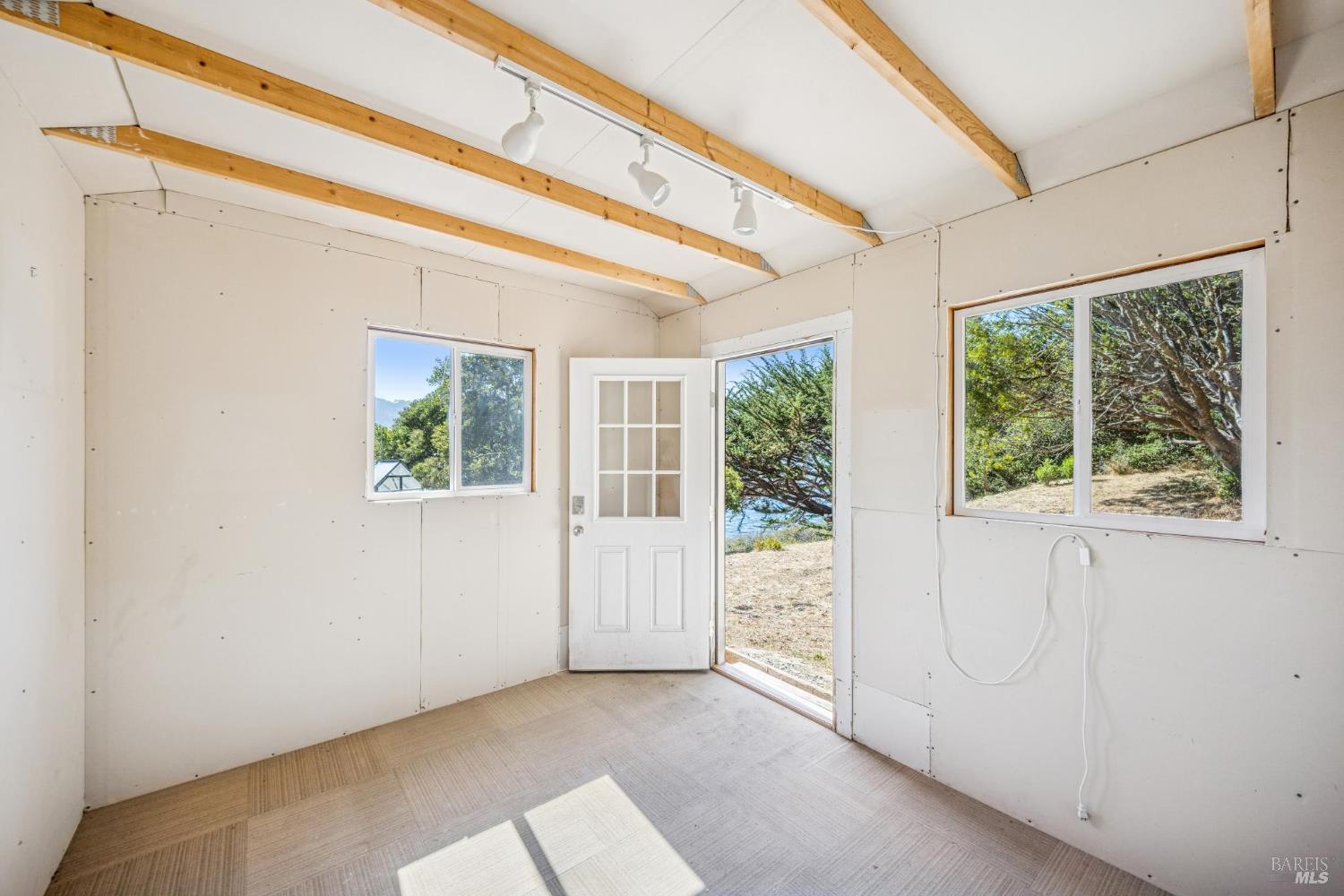 17523 Highway 1 Marshall, CA 94940 - Photo 36 of 72 a view of an empty room with a window