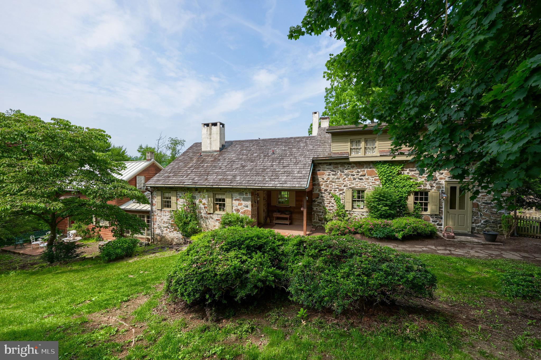 705 Schoffers Road Birdsboro, PA 19508 - Photo 35 of 106 a house view with a garden space