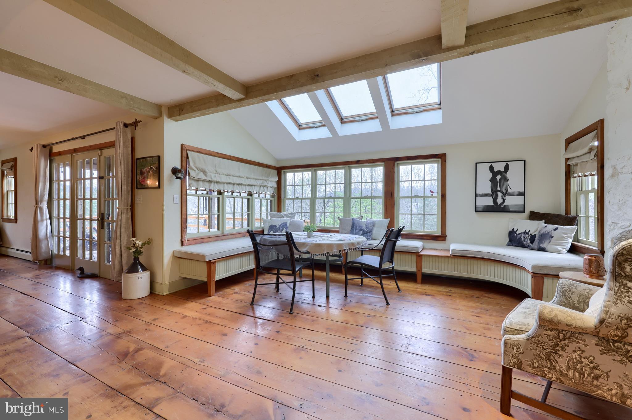 705 Schoffers Road Birdsboro, PA 19508 - Photo 57 of 106 a dining room with furniture a chandelier and wooden floor
