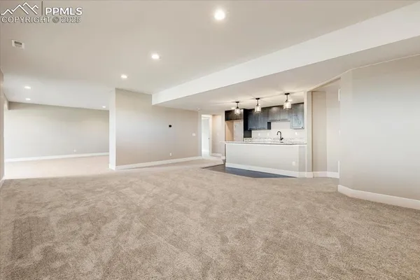 a view of a livingroom with furniture