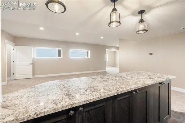 a view of kitchen and center island