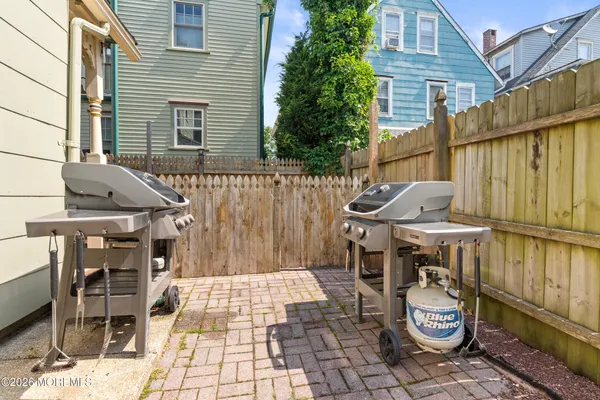 a bedroom with a bed and a table
