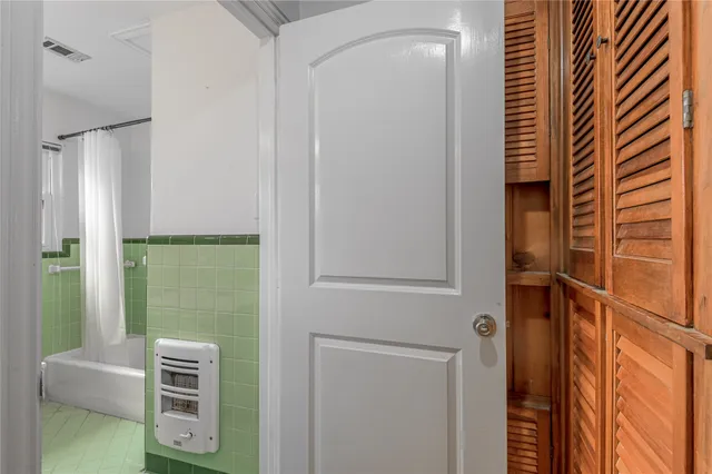 a hallway with windows and yard