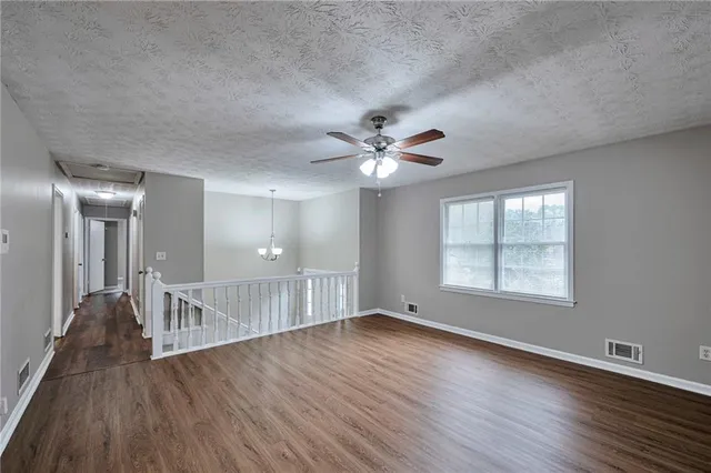 a view of a livingroom with a hardwood floor