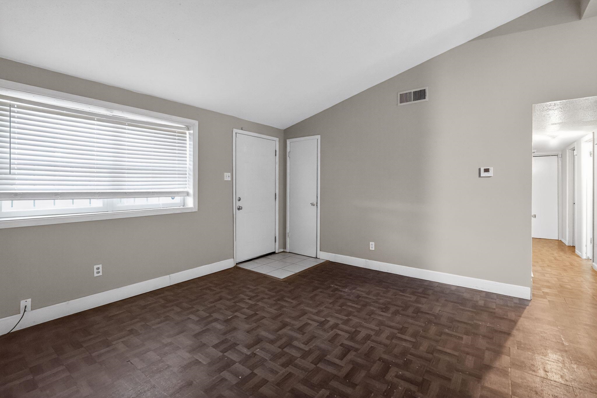 4504 Neely Road Memphis, TN 38109 - Photo 14 of 32 a view of an empty room with window