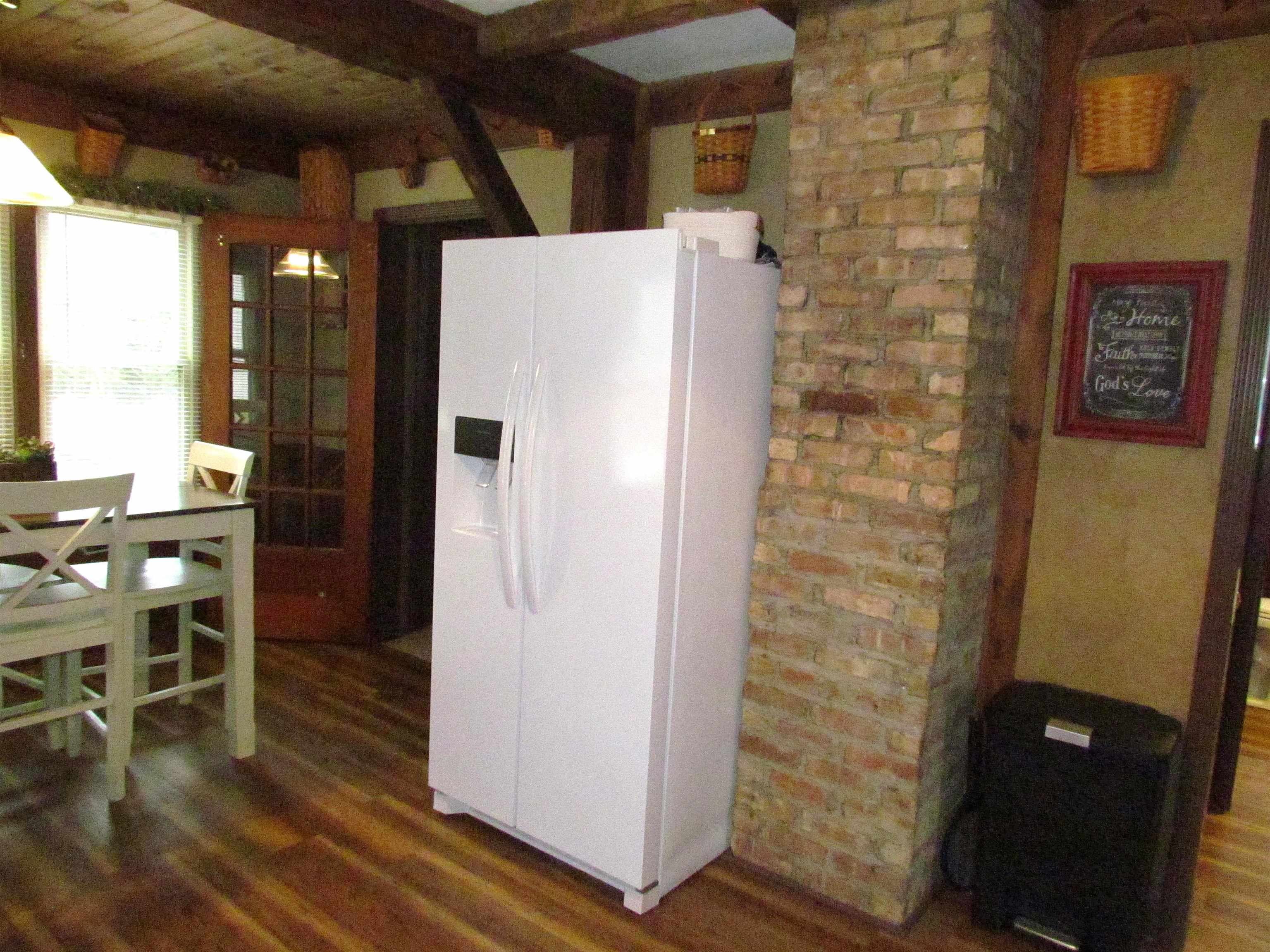 727 Elgin Street Cherry Valley, IL 61016 - Photo 14 of 35 a refrigerator freezer sitting inside of a kitchen