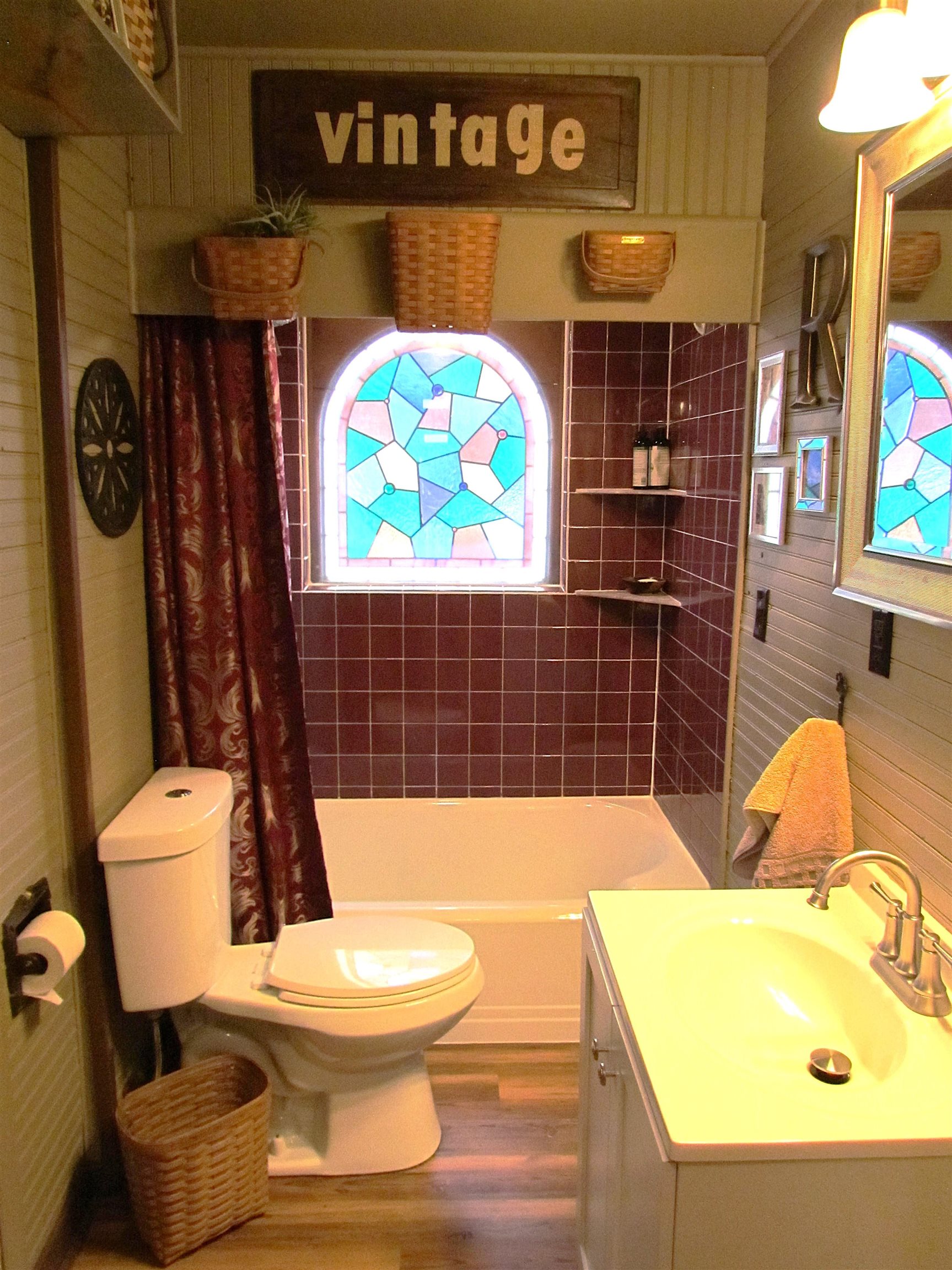 727 Elgin Street Cherry Valley, IL 61016 - Photo 15 of 35 a bathroom with a toilet and a sink