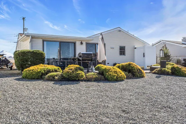 a view of a terrace with furniture and stove