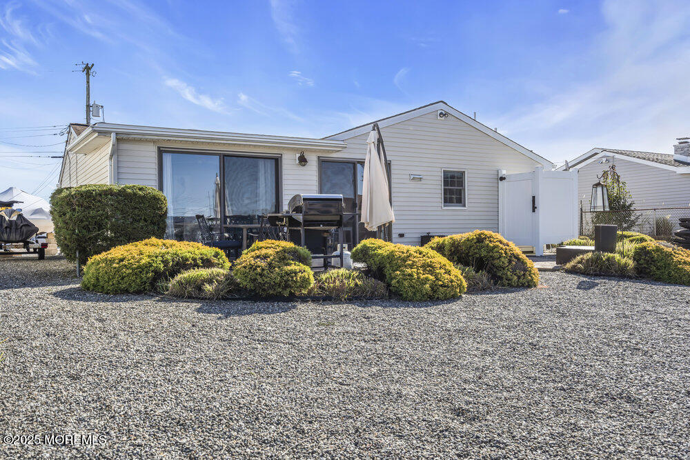 16 Davey Jones Way Waretown, NJ 08758 - Photo 16 of 21 a bedroom with bed and window