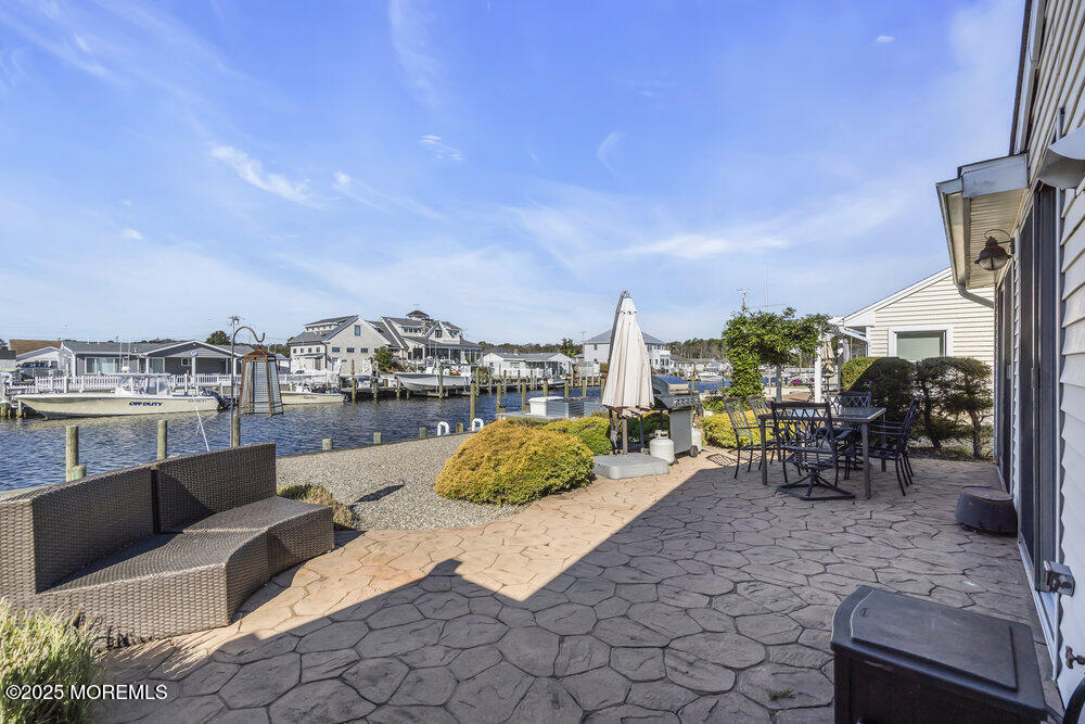 16 Davey Jones Way Waretown, NJ 08758 - Photo 18 of 21 a view of a terrace with furniture