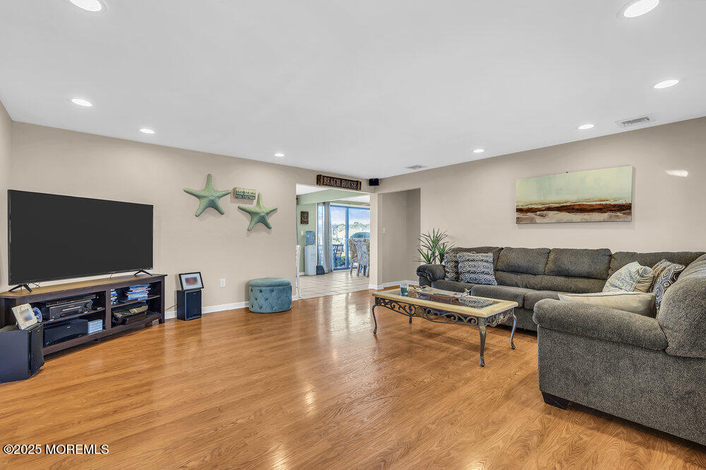 16 Davey Jones Way Waretown, NJ 08758 - Photo 3 of 21 a living room with furniture and a flat screen tv