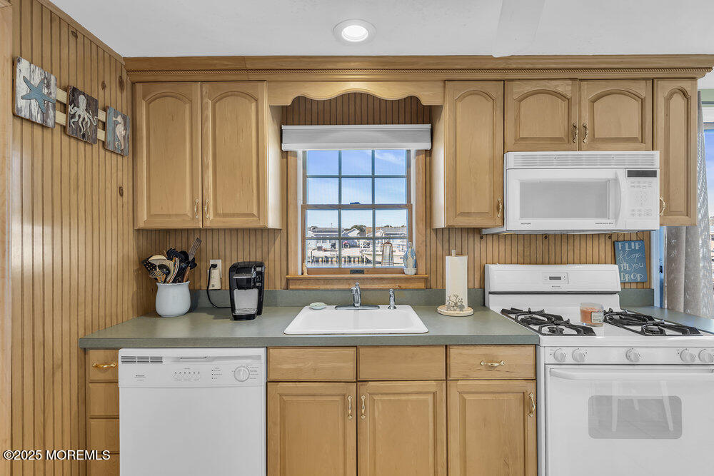 16 Davey Jones Way Waretown, NJ 08758 - Photo 6 of 21 a kitchen with a sink cabinets and window