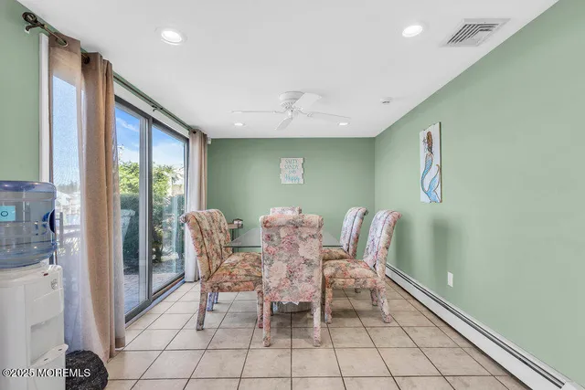 a bathroom with a mirror and a shower