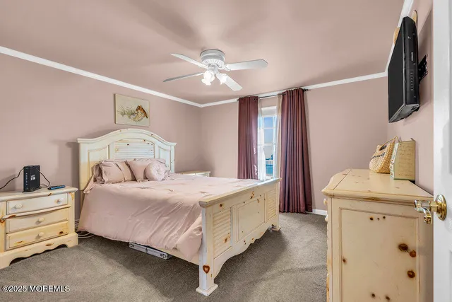 a bathroom with a sink toilet and a mirror