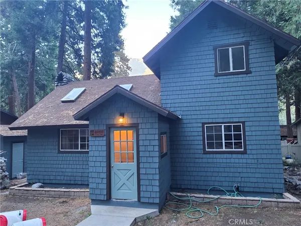 a brick house with a large windows