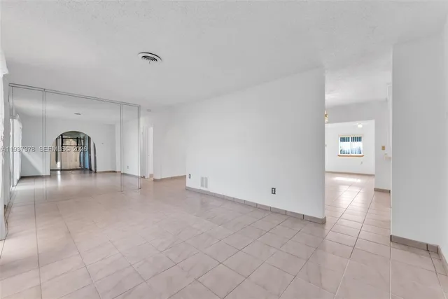 a view of a livingroom with white doors