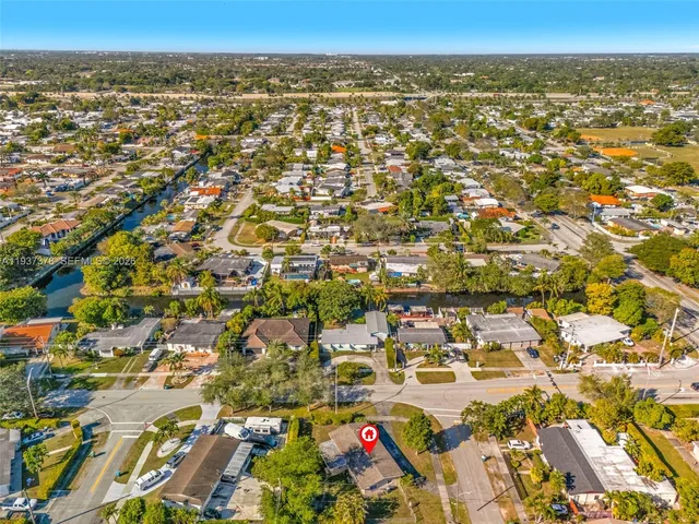 an aerial view of residential building with parking space