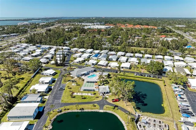 an aerial view of a house with a ocean view