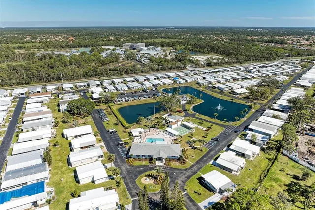 an aerial view of a house with outdoor space