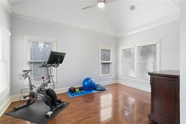 a white bath tub sitting next to a shower