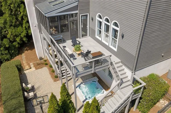 a view of a chair and tables in the house
