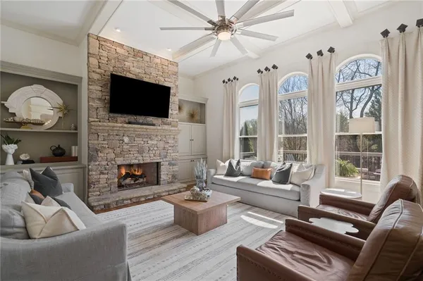 a living room with furniture or outdoor view and a large window