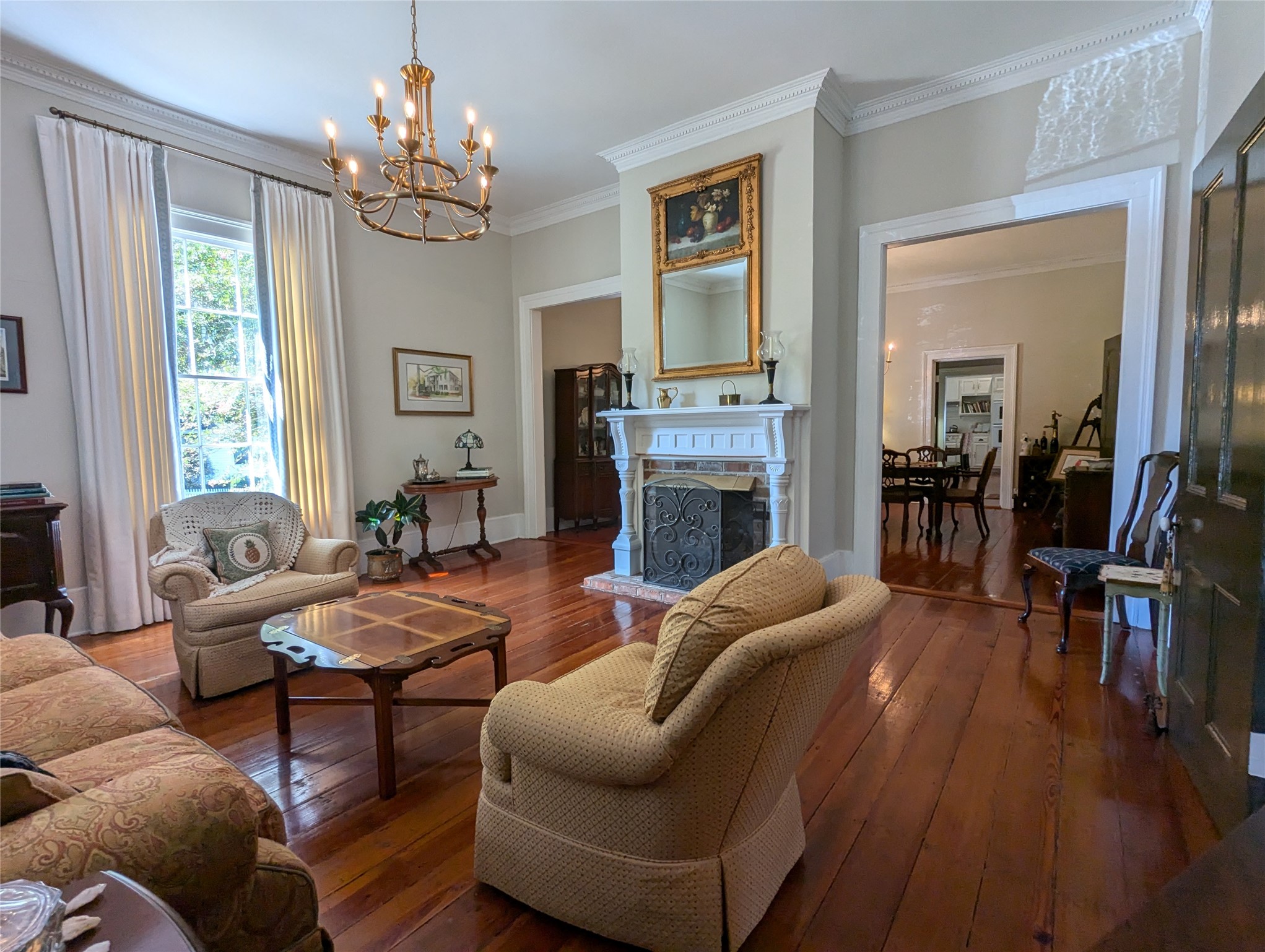 414 Spring Street Washington, GA 30673 - Photo 24 of 42 a living room with furniture and a fireplace