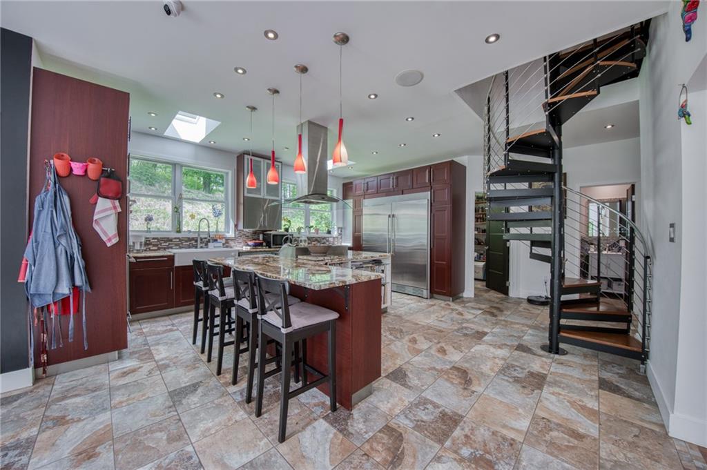236 Hespenheide Road Mars, PA 16046 - Photo 12 of 50 a kitchen with stainless steel appliances granite countertop a sink and a refrigerator