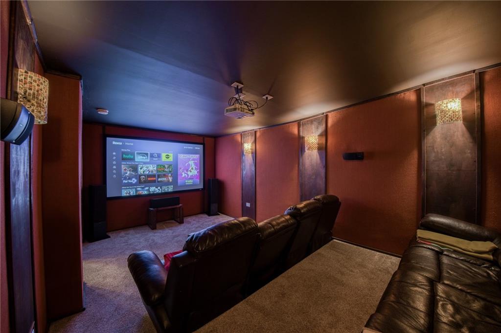 236 Hespenheide Road Mars, PA 16046 - Photo 38 of 50 a room with furniture projector and screen