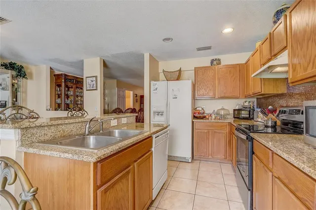 a view of a yard with an outdoor space