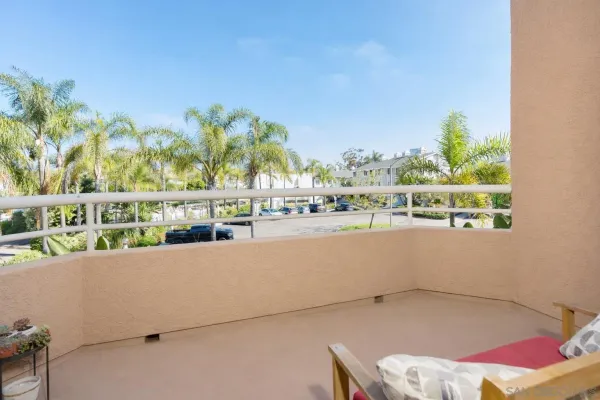 a view of balcony with furniture