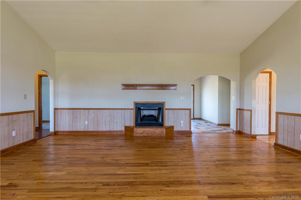 4501 Rowell Road Lancaster, SC 29720 - Photo 3 of 39 a view of empty room with wooden floor