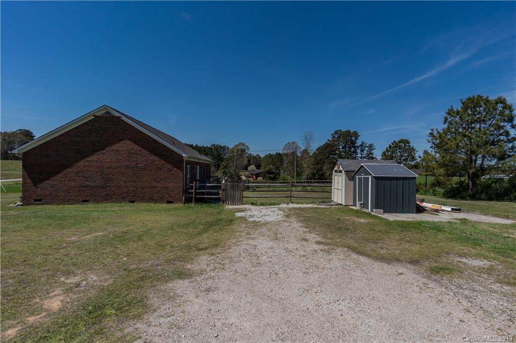 4501 Rowell Road Lancaster, SC 29720 - Photo 24 of 39 a view of a house with a yard