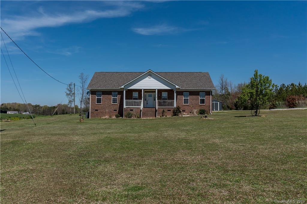 4501 Rowell Road Lancaster, SC 29720 - Photo 27 of 39 a front view of a house with a garden