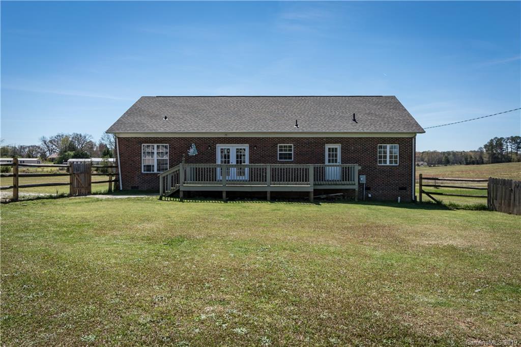 4501 Rowell Road Lancaster, SC 29720 - Photo 30 of 39 a front view of a house with a garden