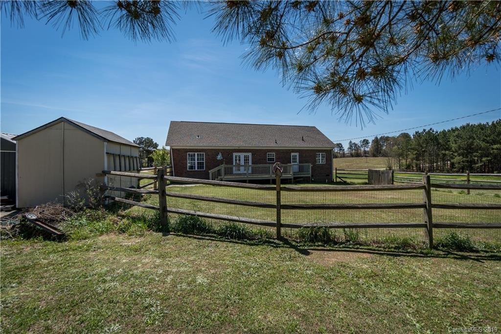 4501 Rowell Road Lancaster, SC 29720 - Photo 31 of 39 a front view of a house with garden