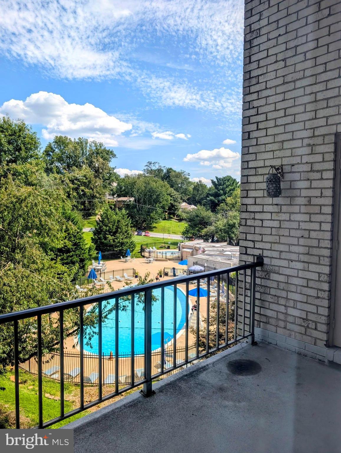 2515 Baltimore Road, Unit 8 Rockville, MD 20853 - Photo 26 of 43 balcony over greenery and pool