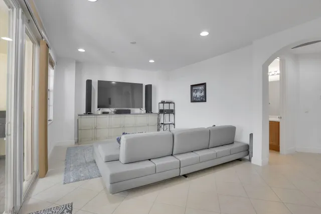 a living room with furniture and a couch