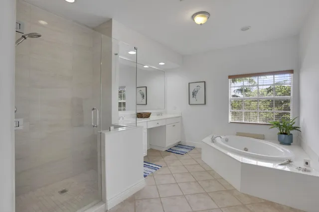 a bathroom with a sink and shower