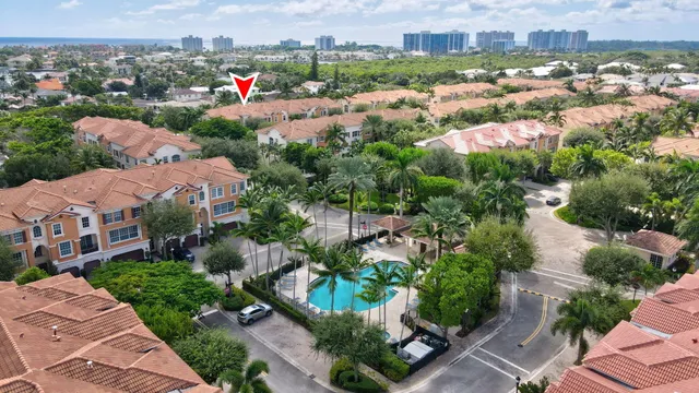 a view of a lake with a house in the background