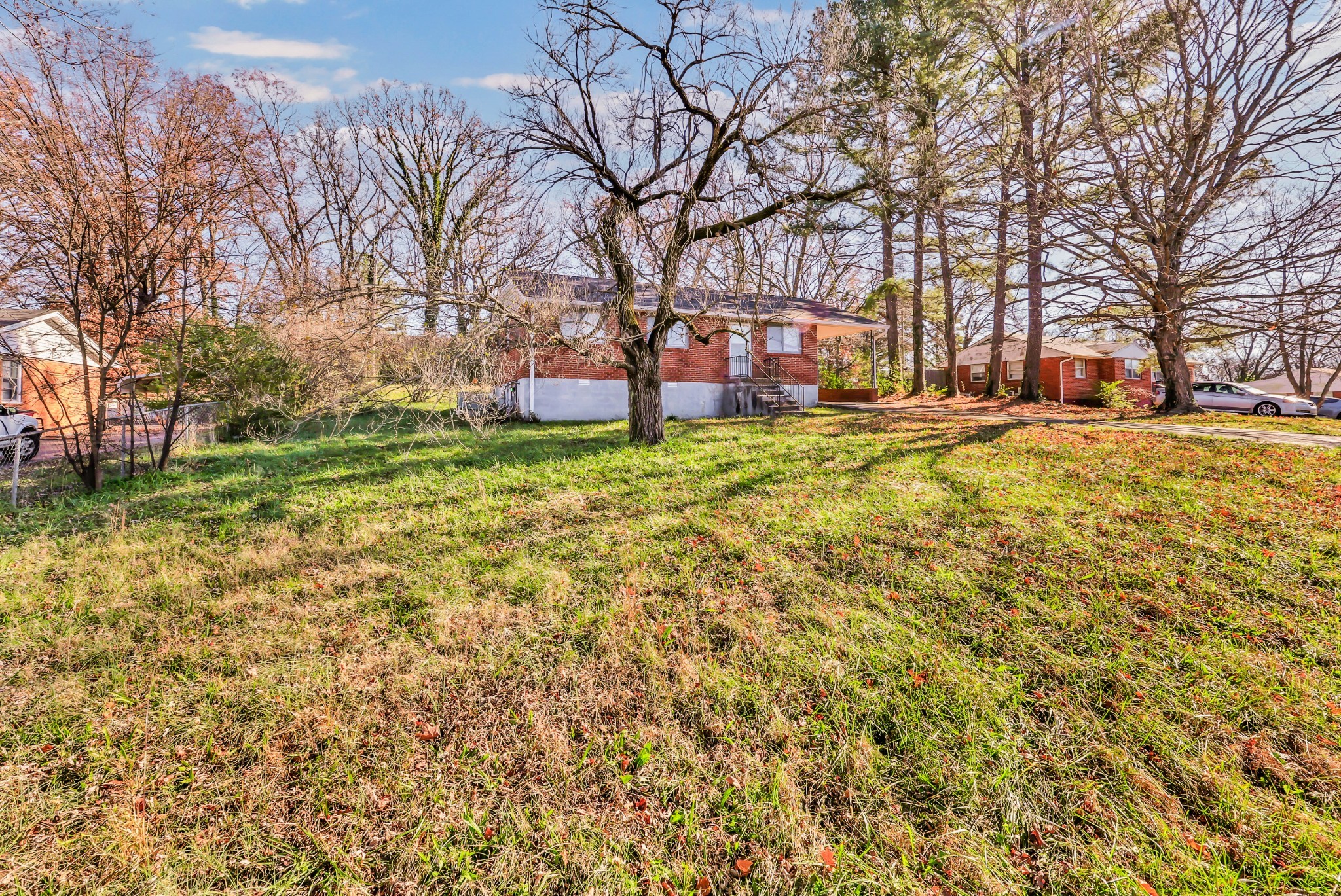 124 Yorktown Road Clarksville, TN 37042 - Photo 19 of 27 a view of a trees with a yard