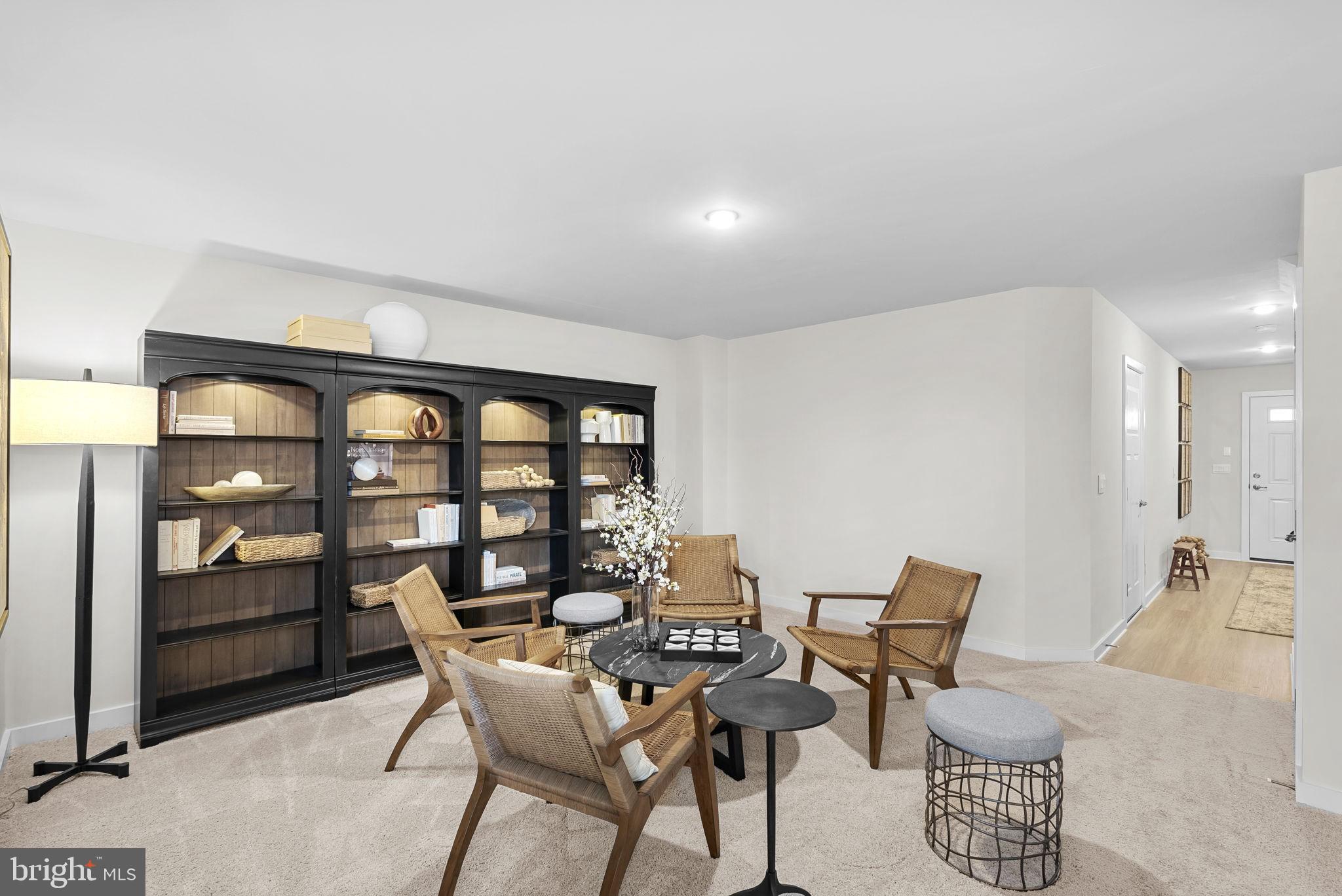 123 Zander Road Inwood, WV 25428 - Photo 5 of 14 a view of a chairs and table in a room