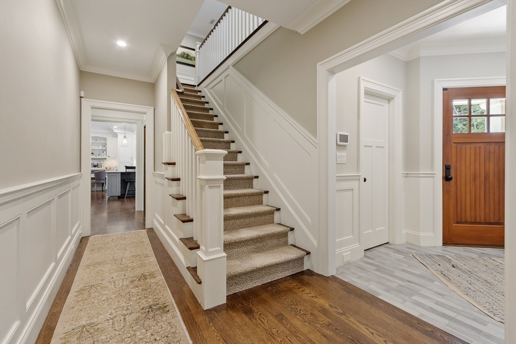 343 Nashawtuc Road Concord, MA 01742 - Photo 13 of 41 a view of a hallway with wooden floor and entryway
